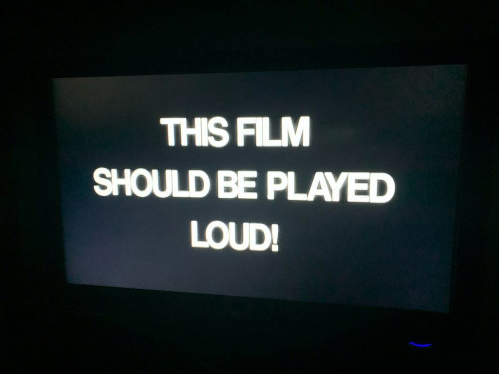 The title card from "The Last Waltz," which reads "THIS FILM SHOULD BE PLAYED LOUD!"